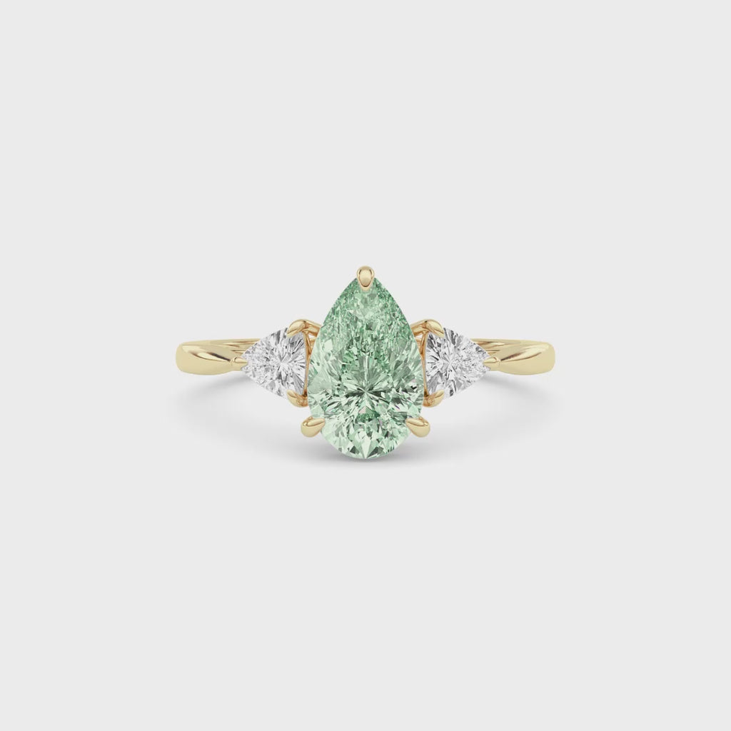 Yellow gold Three-Stone Fancy Green Pear Cut Diamond Ring with Trillion Side Stones