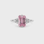 Platinum Three-Stone Fancy Pink Emerald Cut Diamond Ring with Heart Side Stones