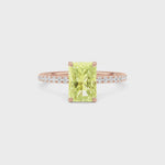 Rose gold Fancy Yellow Radiant Cut Diamond Solitaire with Pavé Band