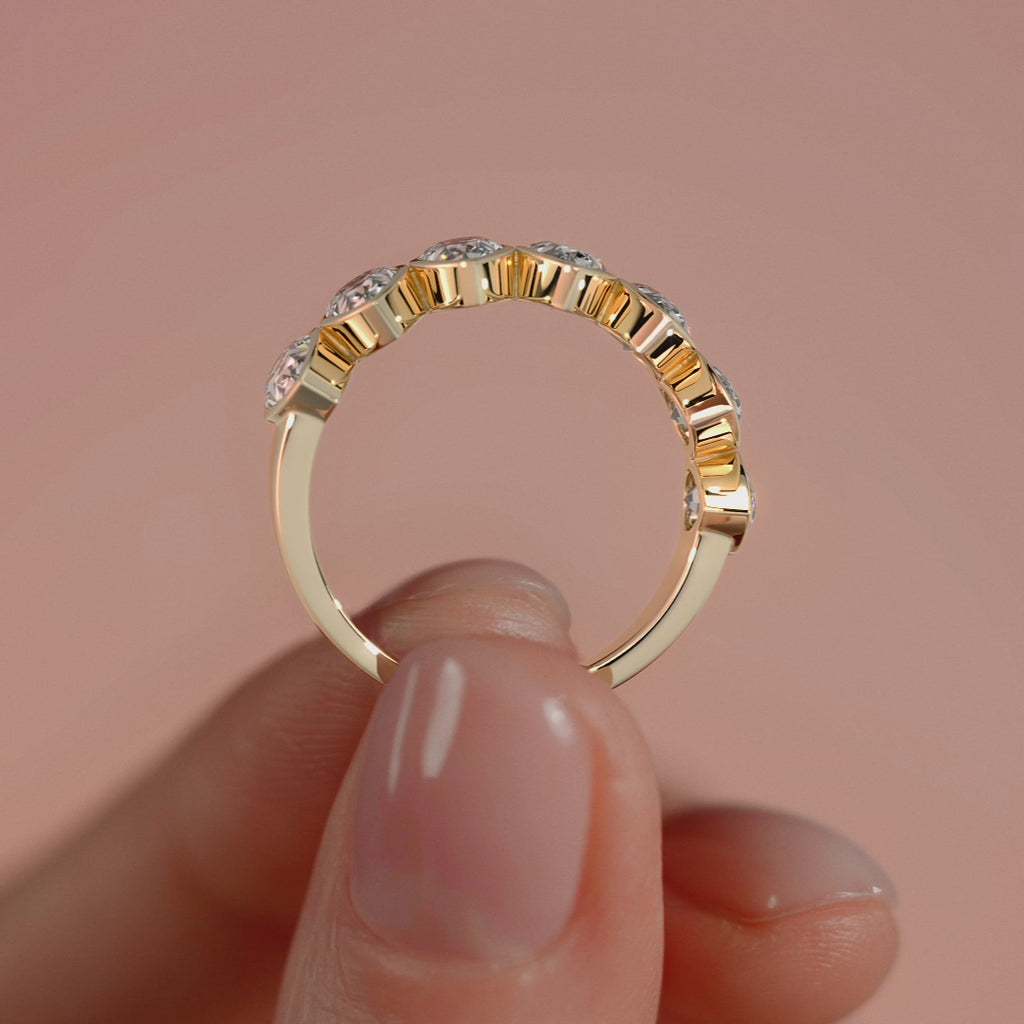 Yellow gold Pear Cut Diamond Half Eternity Band with Bezel Setting