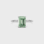 White gold Fancy Green Emerald Cut Diamond Hidden Halo Solitaire Engagement Ring with Prong Setting