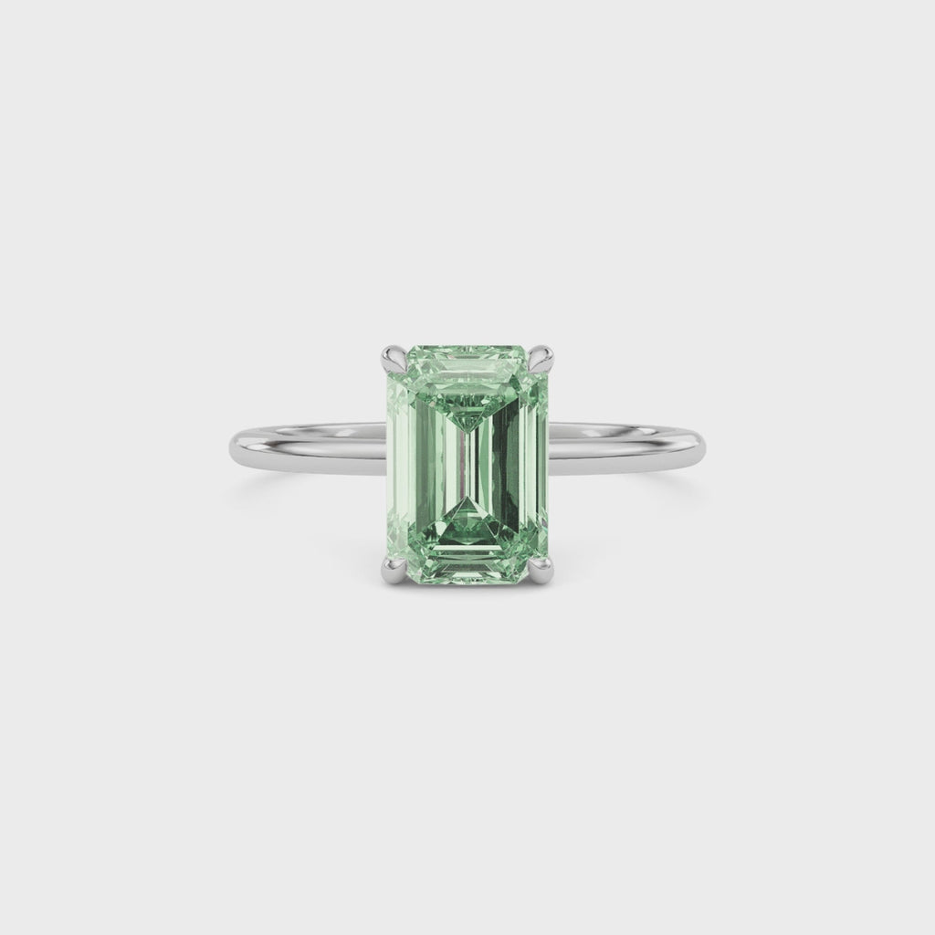 White gold Fancy Green Emerald Cut Diamond Hidden Halo Solitaire Engagement Ring with Prong Setting