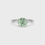 Silver Three-Stone Fancy Green Round Cut Diamond Ring with Tapered Baguette Side Stones