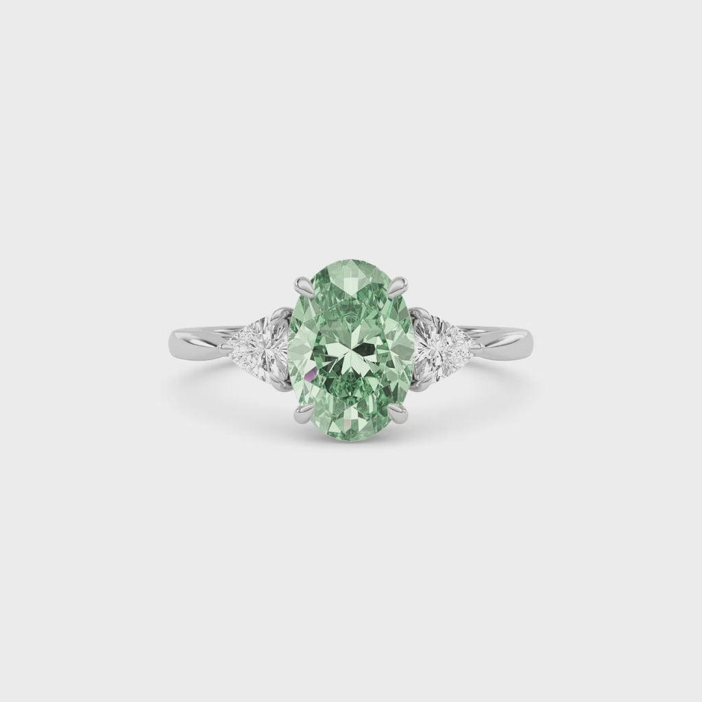 Platinum Three-Stone Fancy Green Oval Cut Diamond Ring with Trillion Side Stones