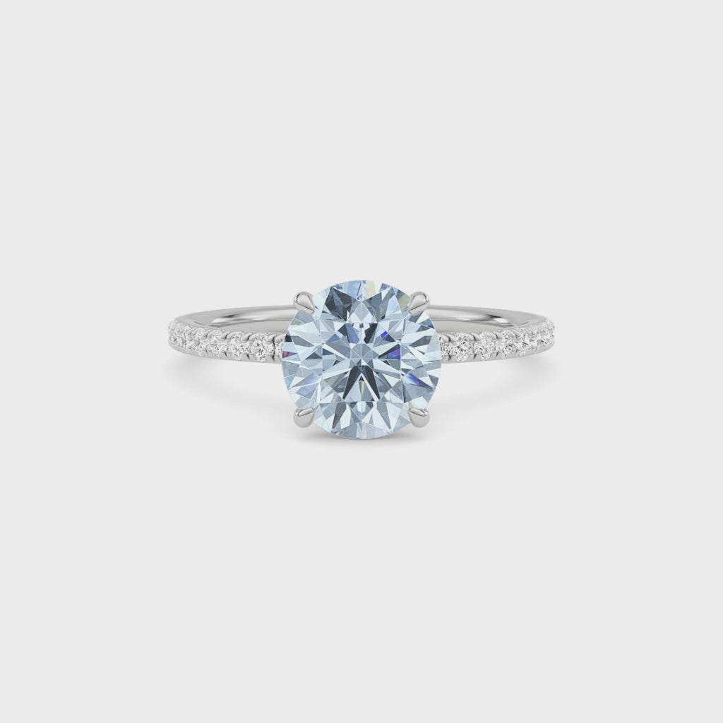 White gold Fancy Blue Round Cut Diamond Solitaire with Pavé Band