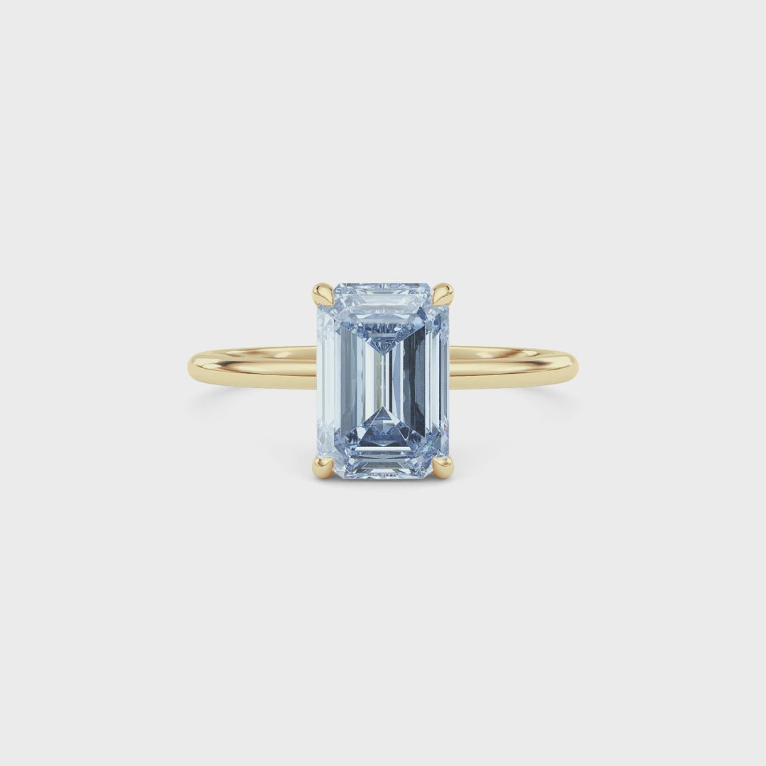 Yellow gold Fancy Blue Emerald Cut Diamond Hidden Halo Solitaire Engagement Ring with Prong Setting