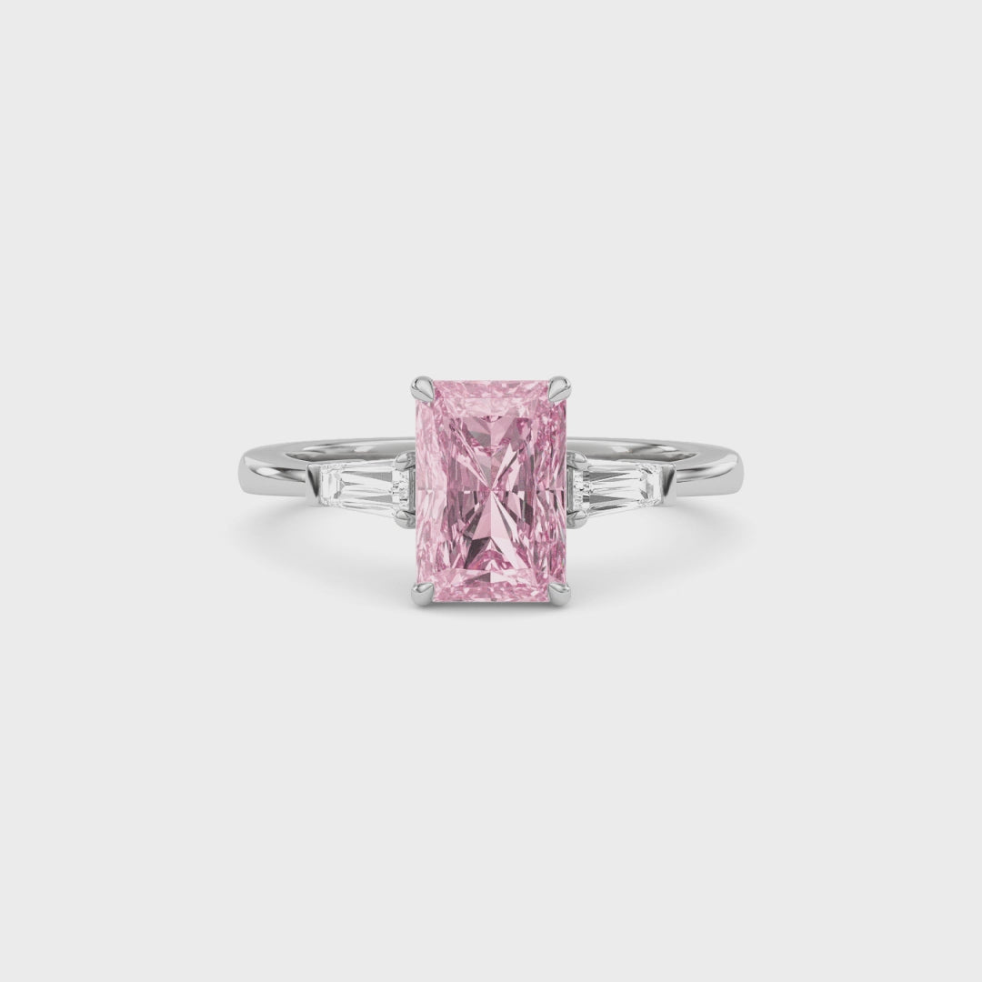 Platinum Three-Stone Fancy Pink Radiant Cut Diamond Ring with Tapered Baguette Side Stones