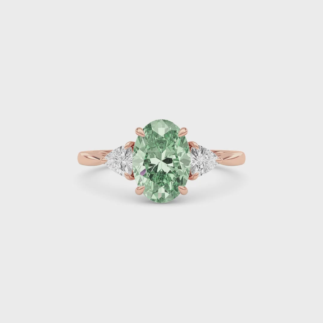 Rose gold Three-Stone Fancy Green Oval Cut Diamond Ring with Trillion Side Stones