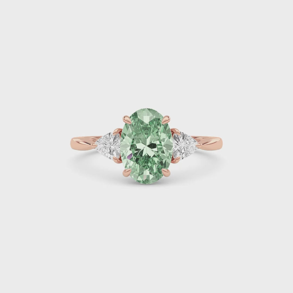 Rose gold Three-Stone Fancy Green Oval Cut Diamond Ring with Trillion Side Stones