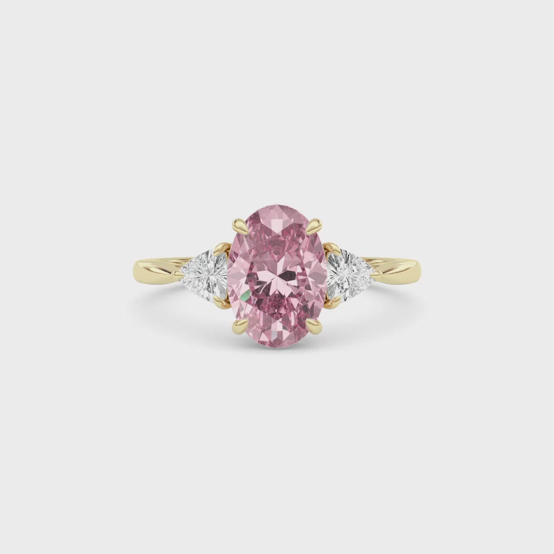 Yellow gold Three-Stone Fancy Pink Oval Cut Diamond Ring with Trillion Side Stones