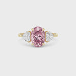 Yellow gold Three-Stone Fancy Pink Oval Cut Diamond Ring with Heart Side Stones