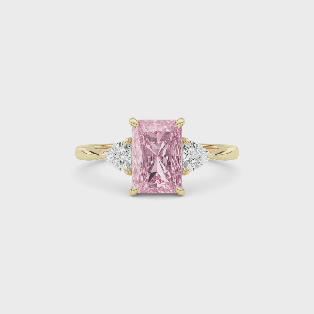 Yellow gold Three-Stone Fancy Pink Radiant Cut Diamond Ring with Trillion Side Stones