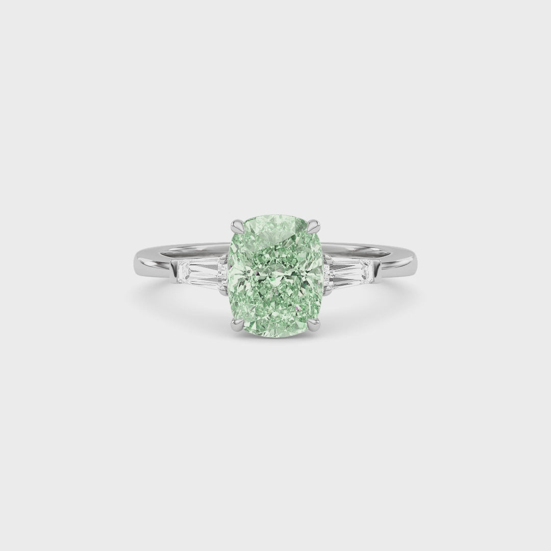 Platinum Three-Stone Fancy Green Cushion Cut Diamond Ring with Tapered Baguette Side Stones