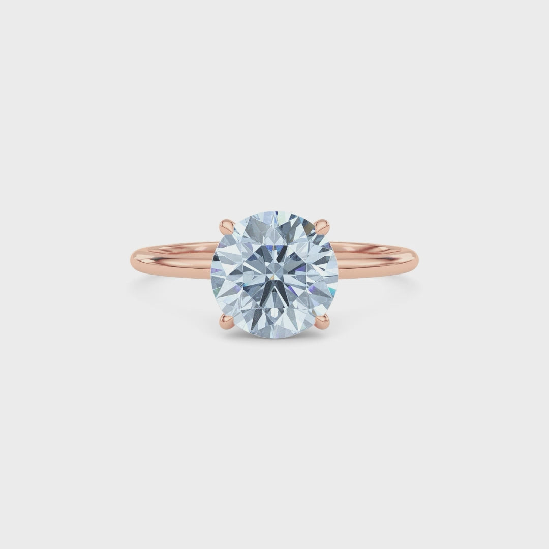 Rose gold Fancy Blue Round Cut Diamond Hidden Halo Solitaire Engagement Ring with Prong Setting