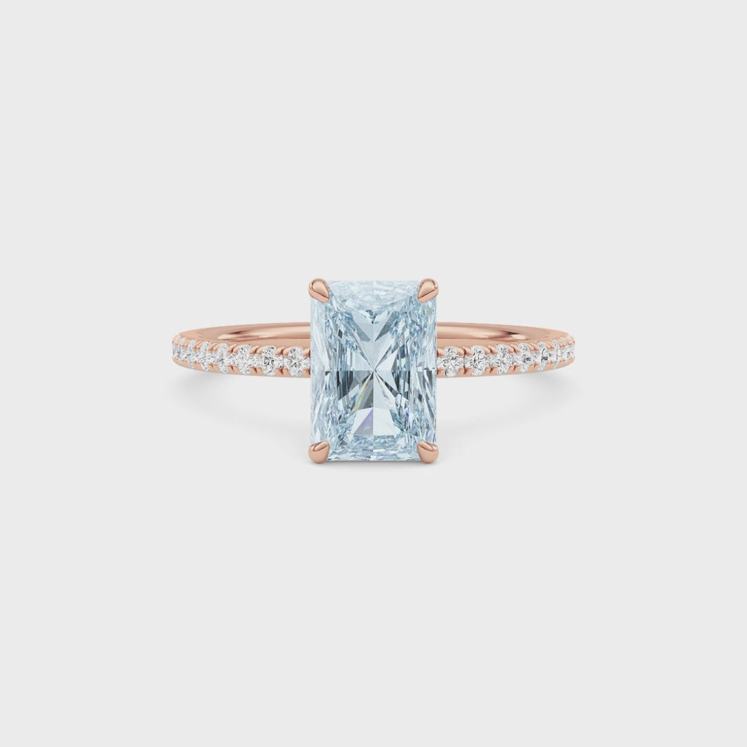 Rose gold Fancy Blue Radiant Cut Diamond Solitaire with Pavé Band