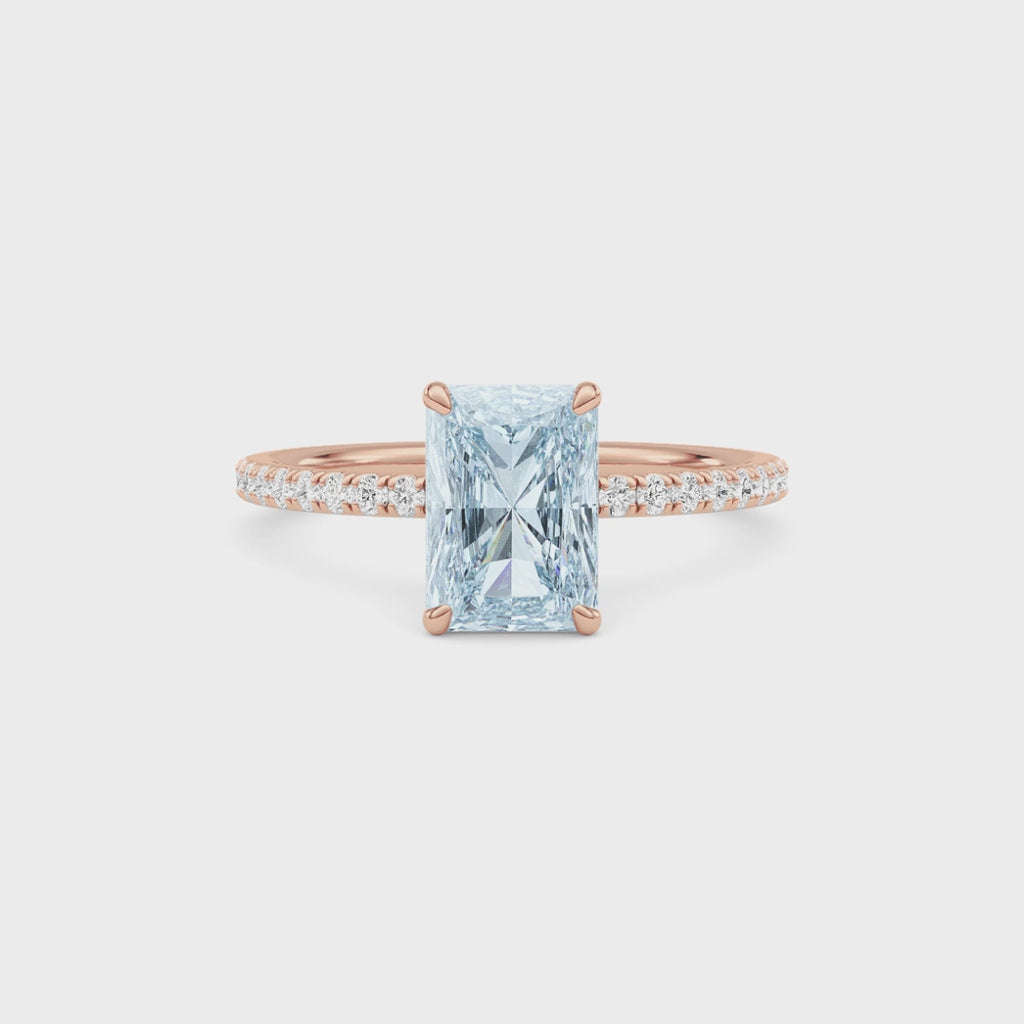 Rose gold Fancy Blue Radiant Cut Diamond Solitaire with Pavé Band
