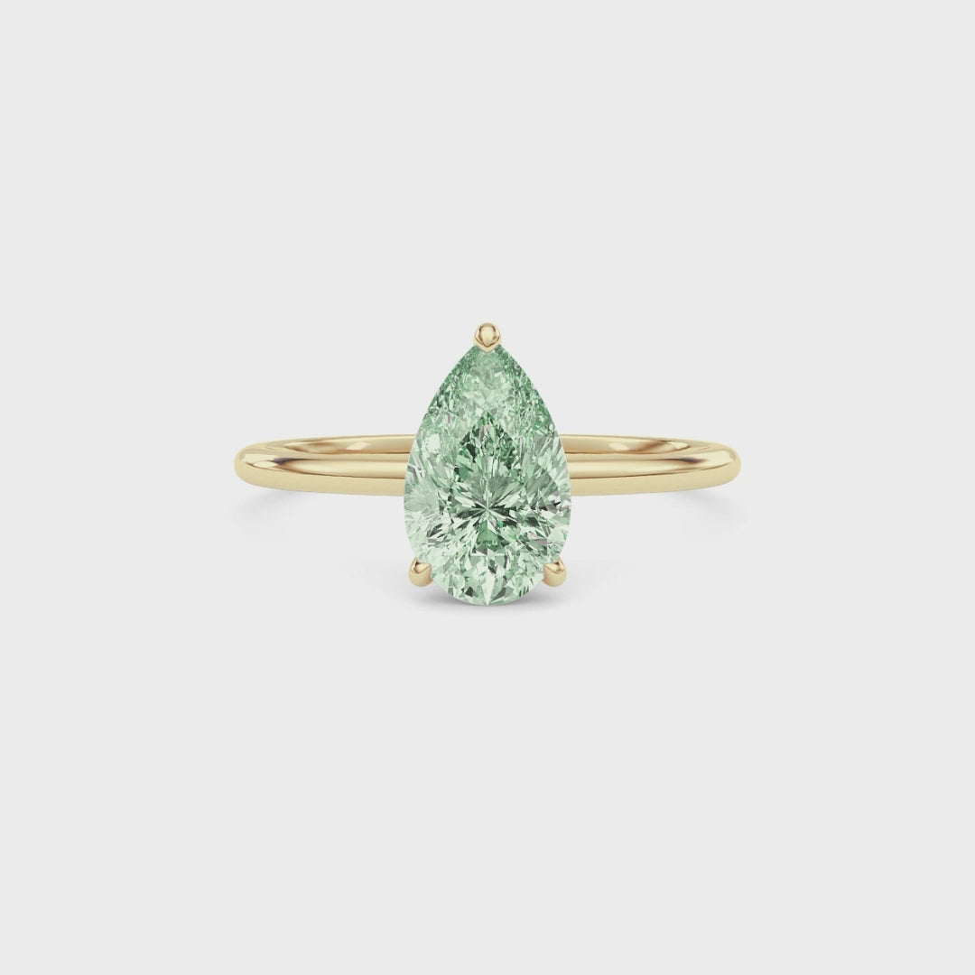 Yellow gold Fancy Green Pear Cut Diamond Hidden Halo Solitaire Engagement Ring with Prong Setting