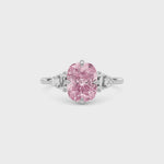 White gold Fancy Pink Cushion Cut Three Stone Diamond Engagement Ring with Tapered Baguette and Round Side Stones