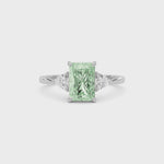 White gold Three-Stone Fancy Green Radiant Cut Diamond Ring with Trillion Side Stones