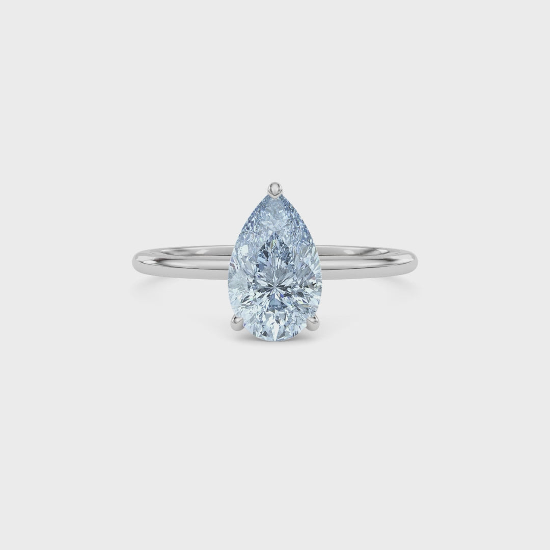 Silver Fancy Blue Pear Cut Diamond Hidden Halo Solitaire Engagement Ring with Prong Setting