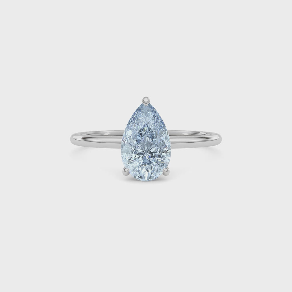 Silver Fancy Blue Pear Cut Diamond Hidden Halo Solitaire Engagement Ring with Prong Setting