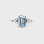 Silver Three-Stone Fancy Blue Emerald Cut Diamond Ring with Heart Side Stones