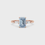 Rose gold Three-Stone Fancy Blue Emerald Cut Diamond Ring with Tapered Baguette Side Stones