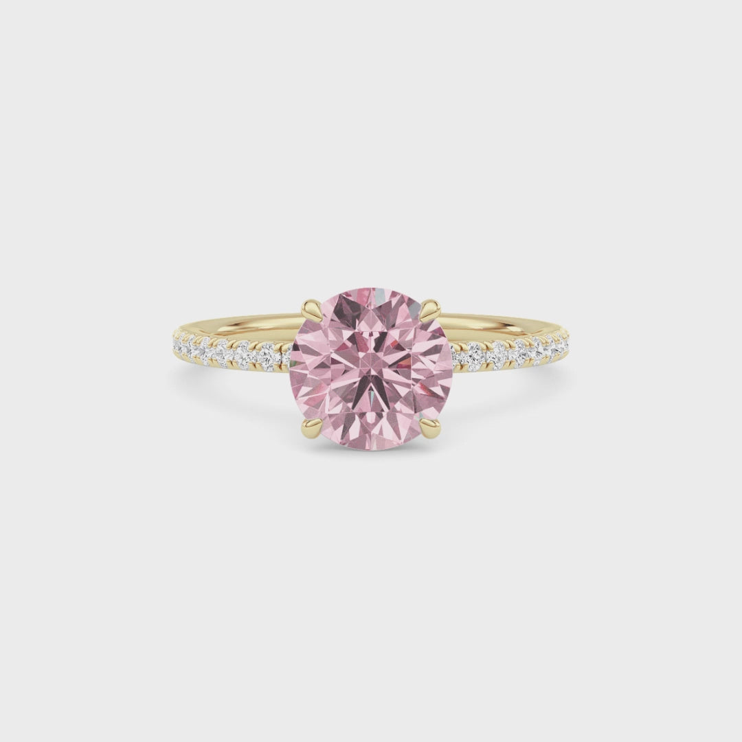 Yellow gold Fancy Pink Round Cut Diamond Solitaire with Pavé Band