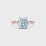 Rose gold Three-Stone Fancy Blue Radiant Cut Diamond Ring with Trillion Side Stones
