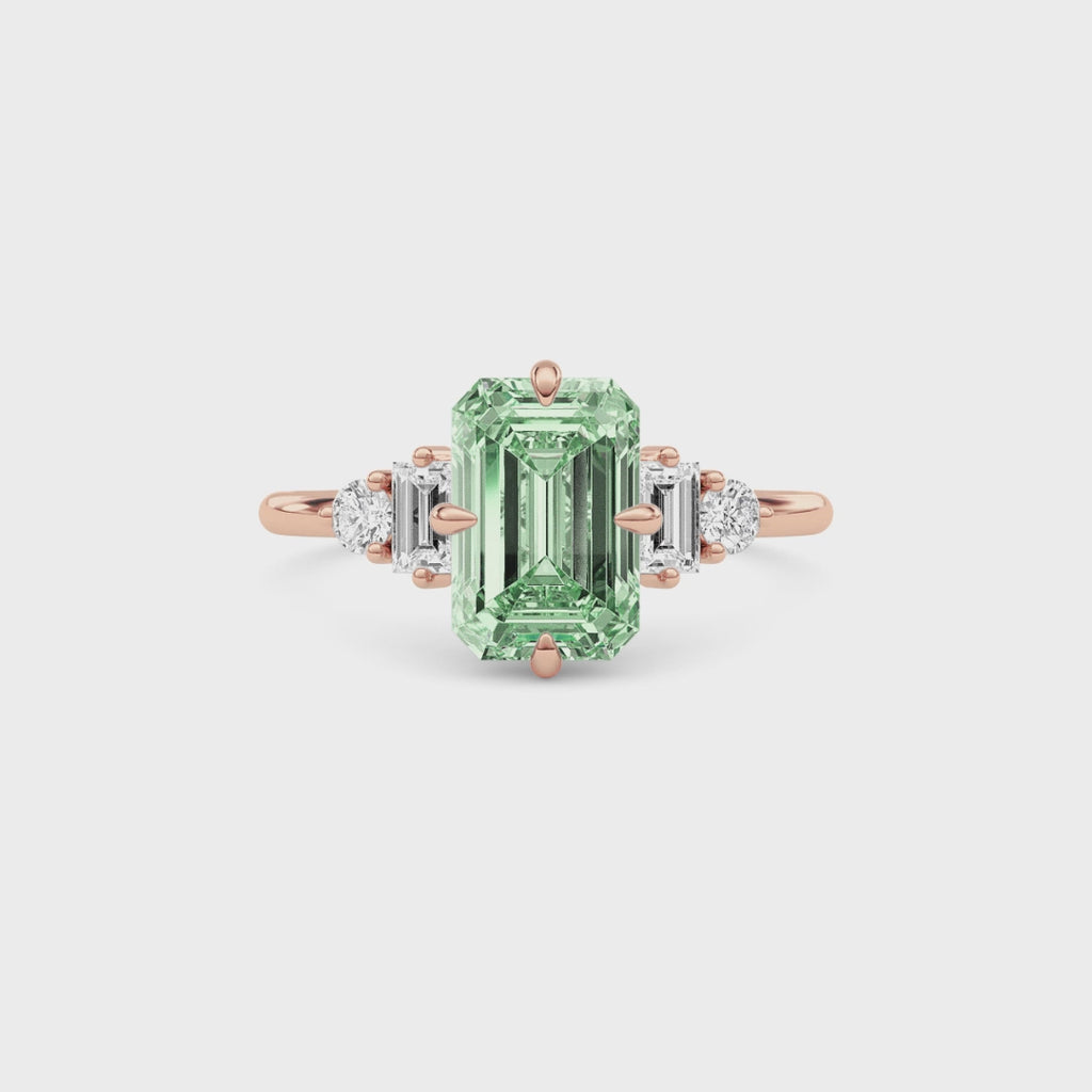 Rose gold Three-Stone Fancy Green Emerald Cut Diamond Ring with Heart Side Stones