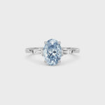 Silver Three-Stone Fancy Blue Oval Cut Diamond Ring with Tapered Baguette Side Stones