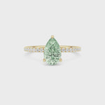 Yellow gold Fancy Green Pear Cut Diamond Solitaire with Pavé Band