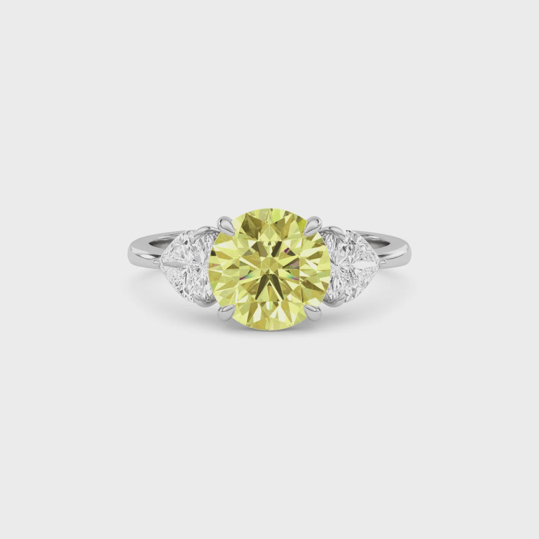 Yellow gold Three-Stone Fancy Yellow Round Cut Diamond Ring with Heart Side Stones