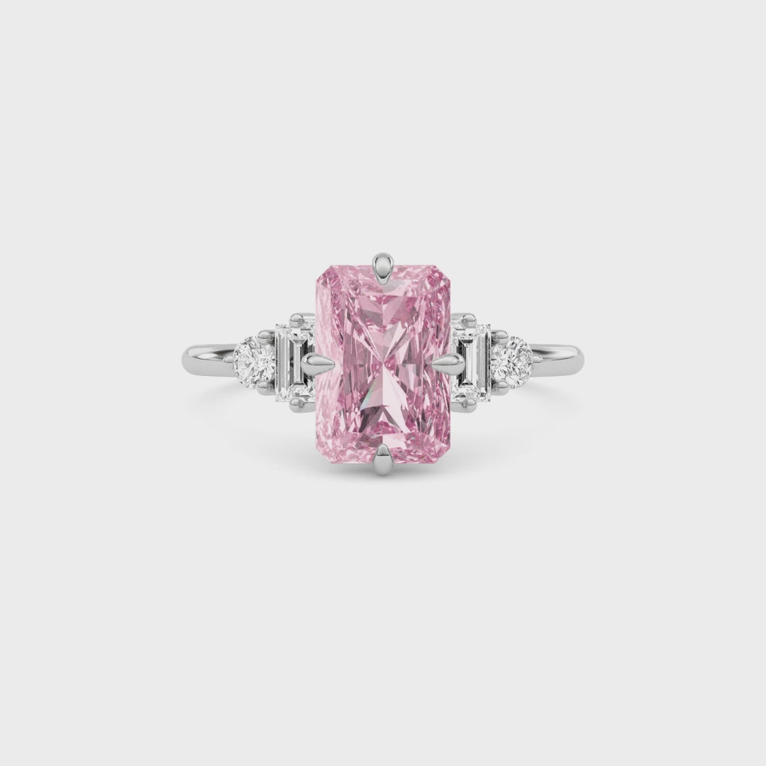 White gold Three-Stone Fancy Pink Radiant Cut Diamond Ring with Heart Side Stones