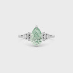 Platinum Fancy Green Pear Cut Three Stone Diamond Engagement Ring with Tapered Baguette and Round Side Stones