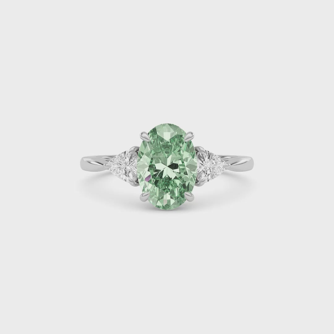 White gold Three-Stone Fancy Green Oval Cut Diamond Ring with Trillion Side Stones