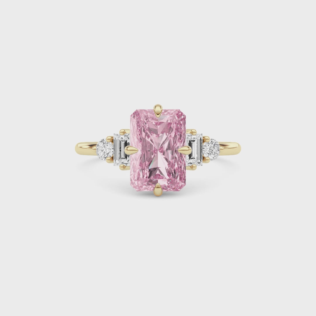 Yellow gold Three-Stone Fancy Pink Radiant Cut Diamond Ring with Heart Side Stones