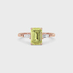 Rose gold Three-Stone Fancy Yellow Emerald Cut Diamond Ring with Tapered Baguette Side Stones