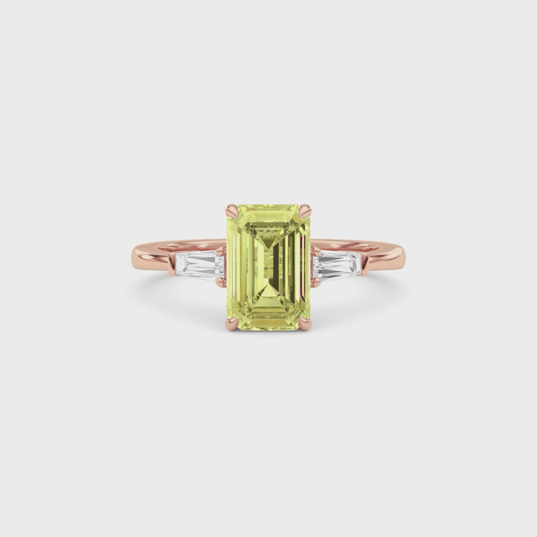 Rose gold Three-Stone Fancy Yellow Emerald Cut Diamond Ring with Tapered Baguette Side Stones