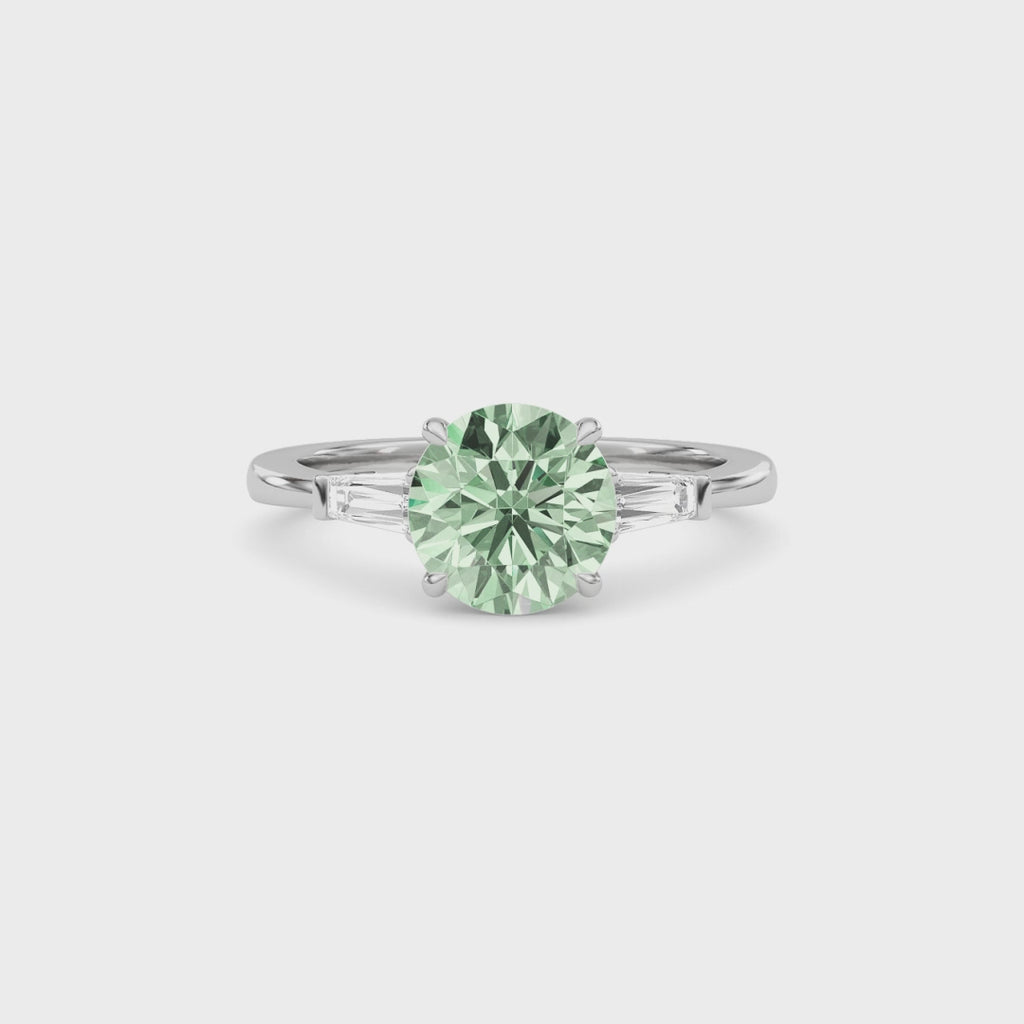 Platinum Three-Stone Fancy Green Round Cut Diamond Ring with Tapered Baguette Side Stones