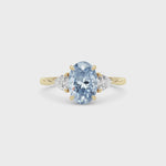 Yellow gold Three-Stone Fancy Blue Oval Cut Diamond Ring with Trillion Side Stones