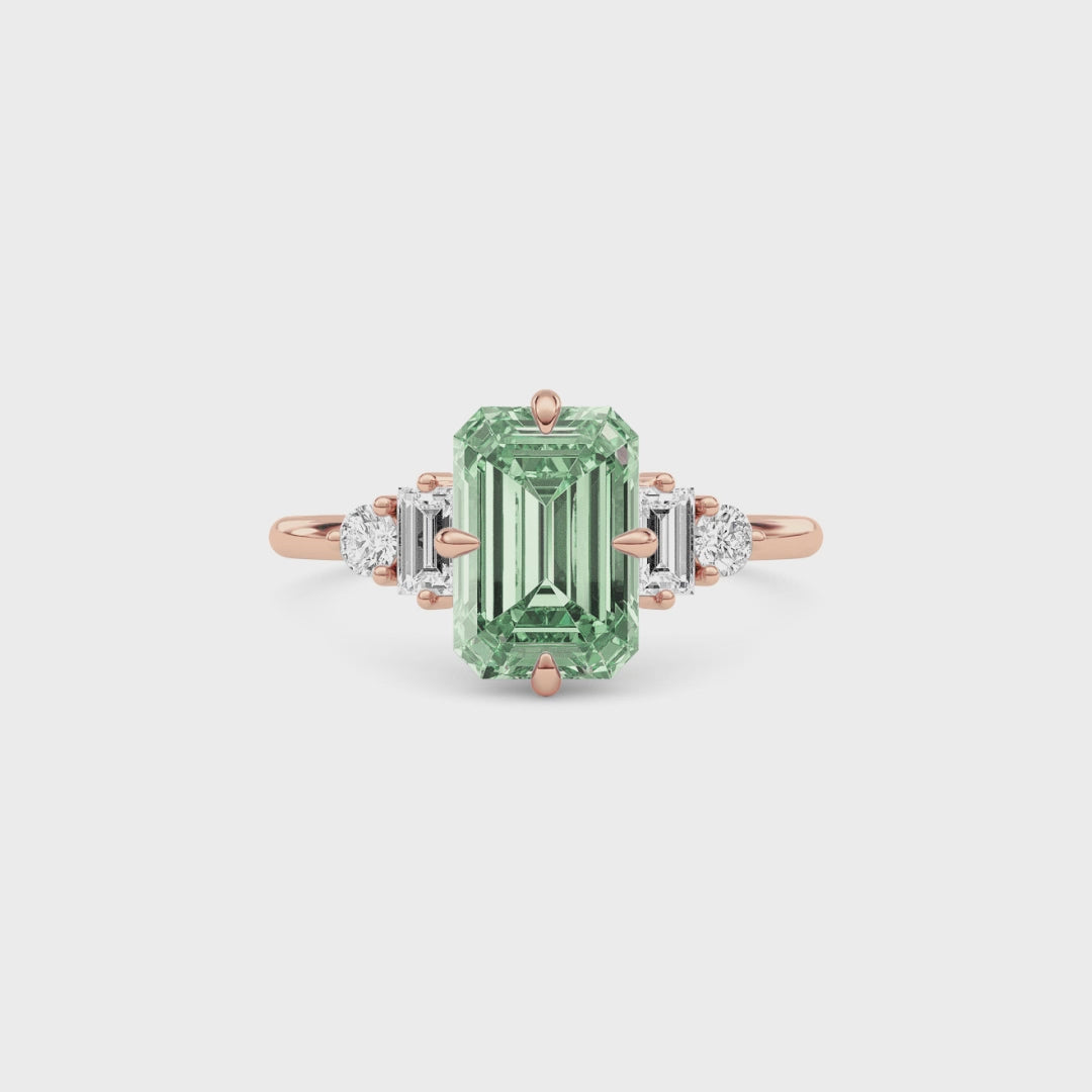 Rose gold Fancy Green Emerald Cut Three Stone Diamond Engagement Ring with Tapered Baguette and Round Side Stones
