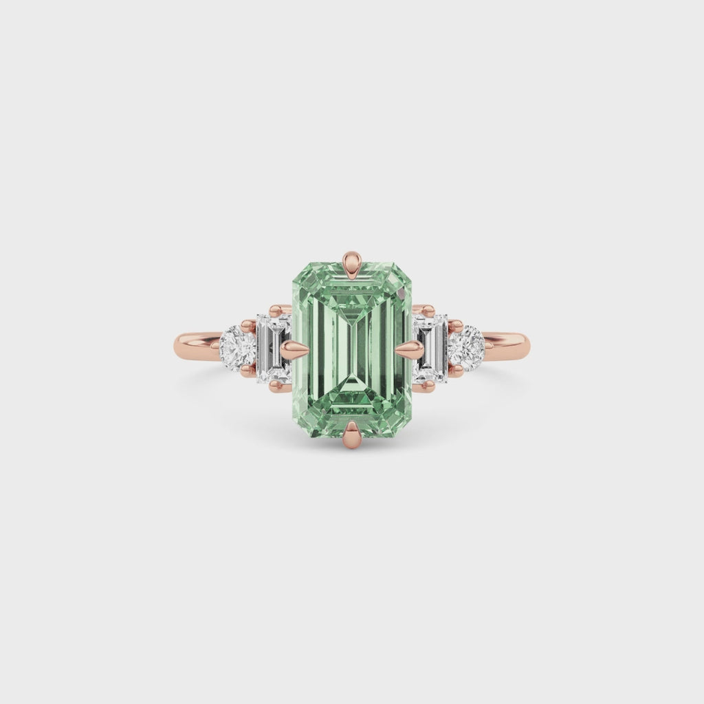 Rose gold Fancy Green Emerald Cut Three Stone Diamond Engagement Ring with Tapered Baguette and Round Side Stones