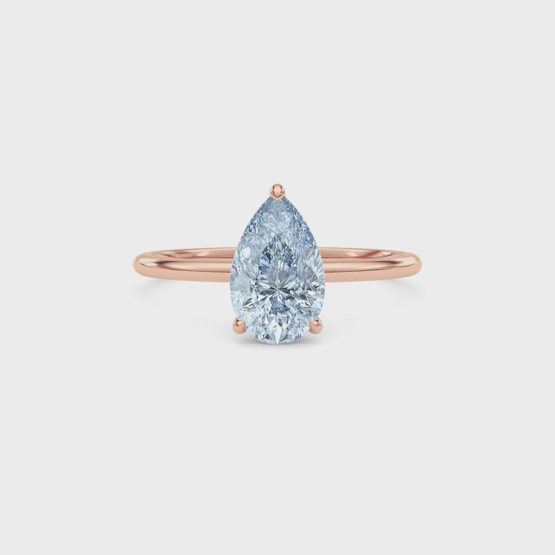Rose gold Fancy Blue Pear Cut Diamond Hidden Halo Solitaire Engagement Ring with Prong Setting