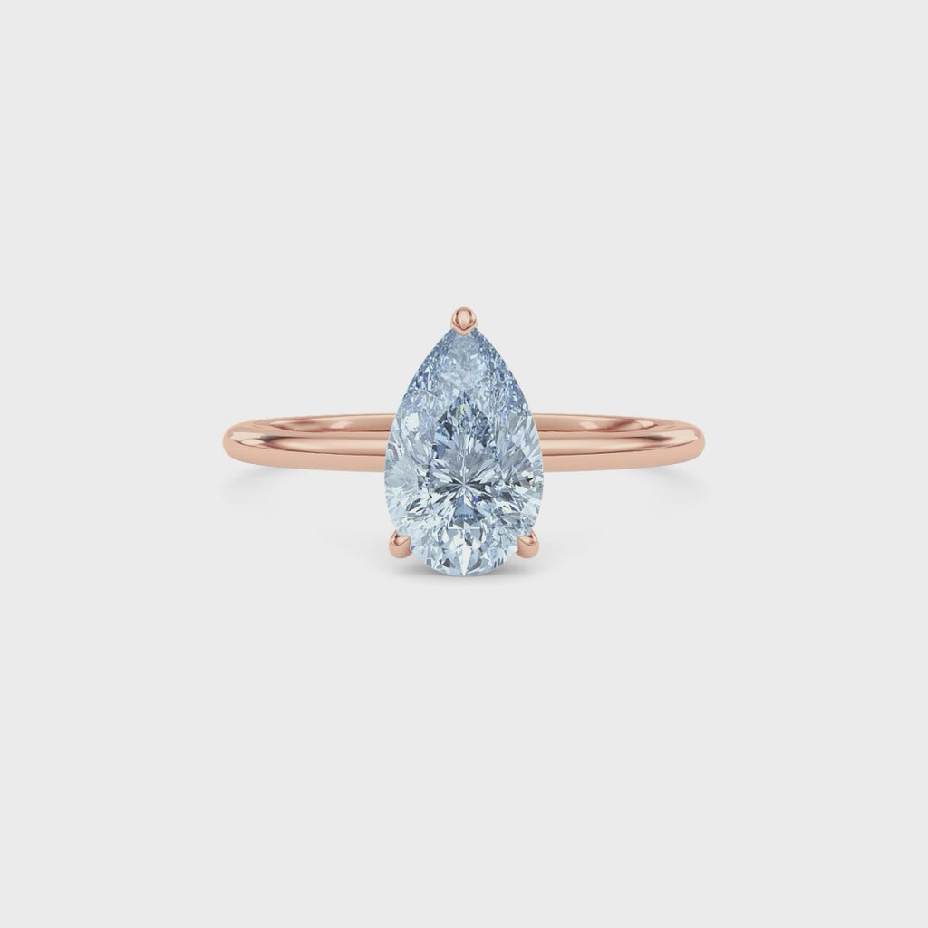 Rose gold Fancy Blue Pear Cut Diamond Hidden Halo Solitaire Engagement Ring with Prong Setting