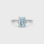 Silver Three-Stone Fancy Blue Radiant Cut Diamond Ring with Tapered Baguette Side Stones