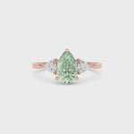 Rose gold Three-Stone Fancy Green Pear Cut Diamond Ring with Trillion Side Stones