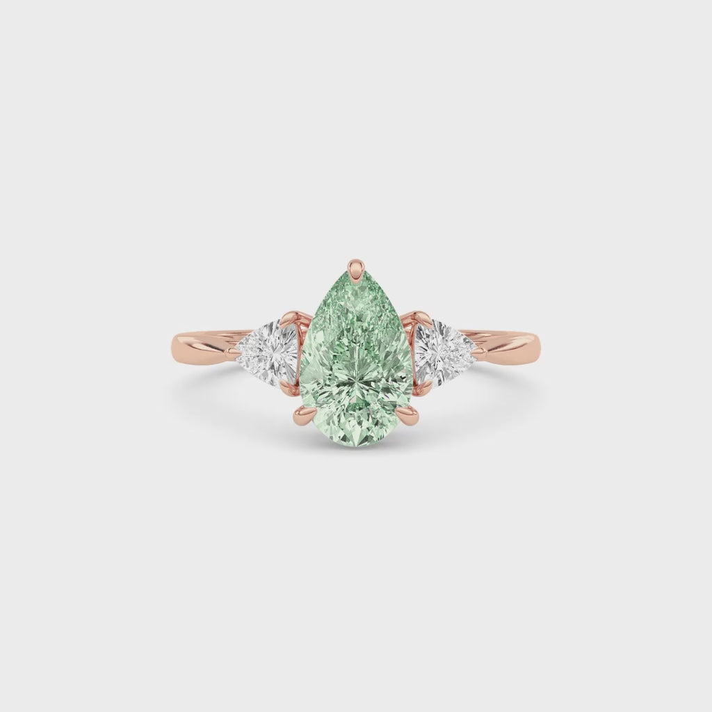 Rose gold Three-Stone Fancy Green Pear Cut Diamond Ring with Trillion Side Stones