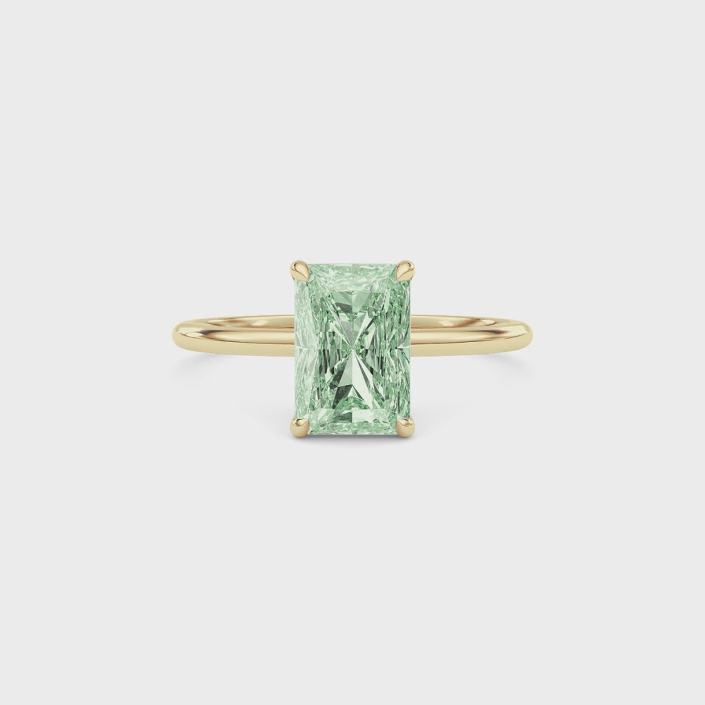 Yellow gold Fancy Green Radiant Cut Diamond Hidden Halo Solitaire Engagement Ring with Prong Setting