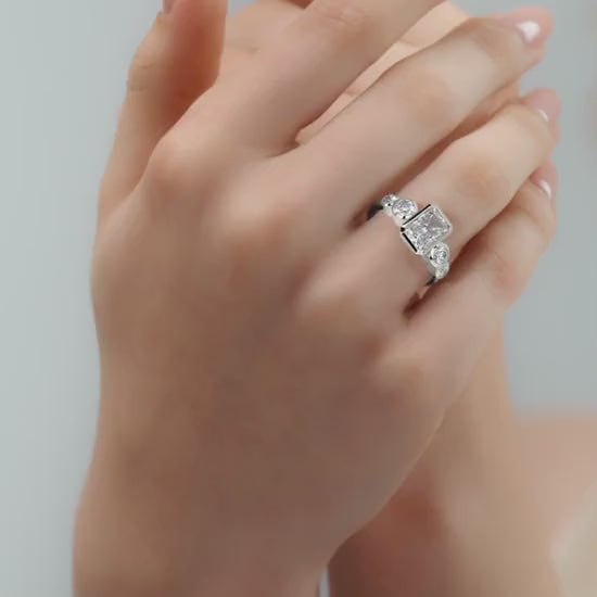 Platinum Radiant Diamond Ring with Bezel Setting and Round Side Accents